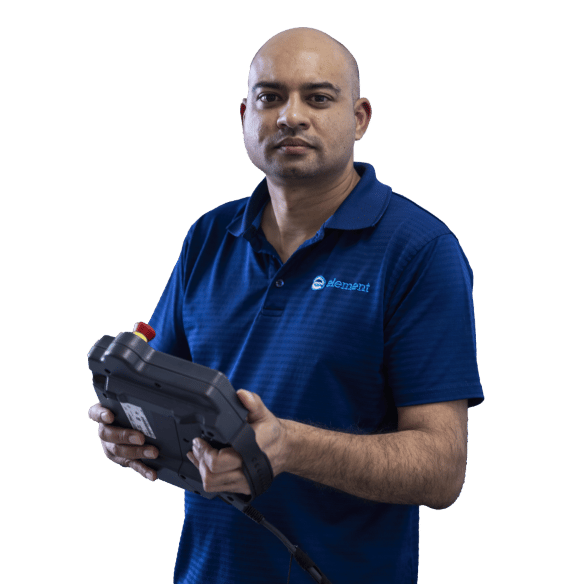 product qualification testing expert holding control panel