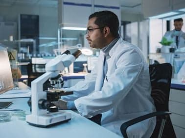Element scientist testing biologics in lab