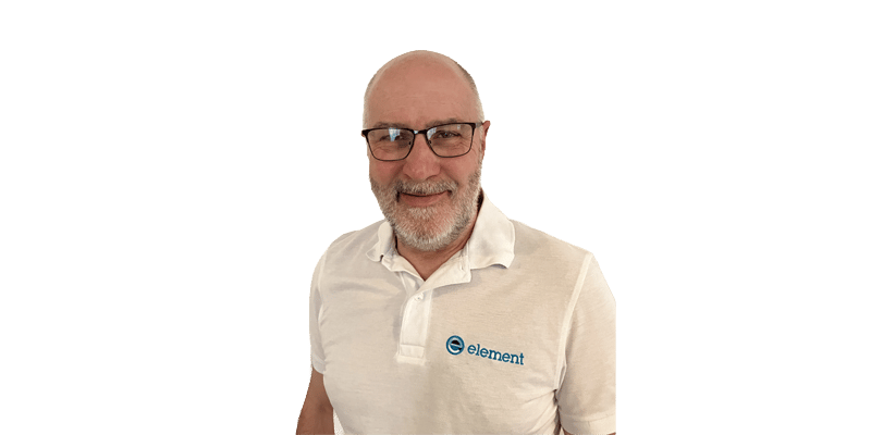 Steve Massey, Principal Engineer in Digital Engineering at Element, smiling, wearing glasses and a white Element-branded polo shirt with Element logo.