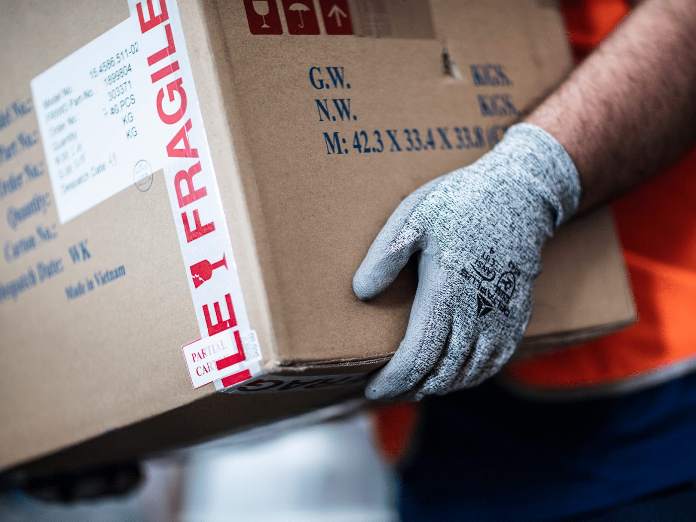 A worker carrying packages