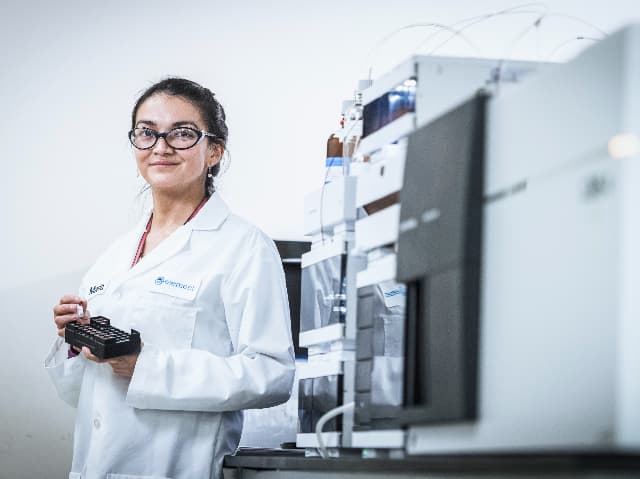 Pharmaceutical scientist preparing samples for NDSRI nitrosamine impurity testing in analytical laboratory