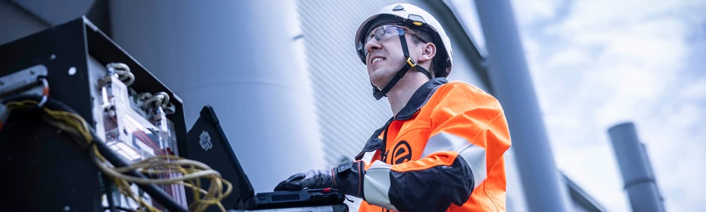 Stack engineer taking emissions sample on-site