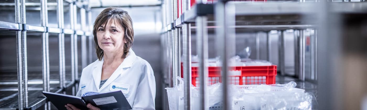 Element scientist managing ICH-compliant stability storage chambers with pharmaceutical samples for long-term testing program