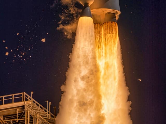 Static fire test of a rocket engine on a thrust stand.