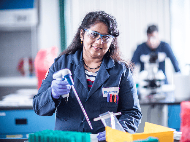 Element laboratory technician preparing samples with precision instruments for chemical analysis