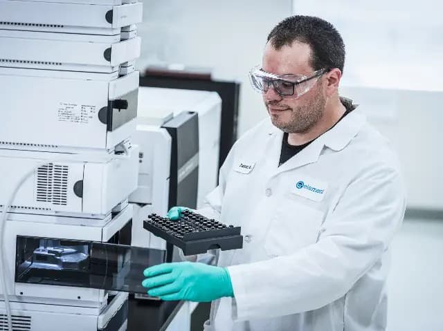 Man in lab coat testng