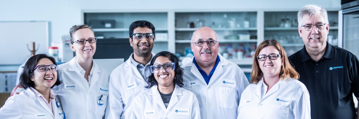 Element team of scientists and testing engineers in laboratory setting