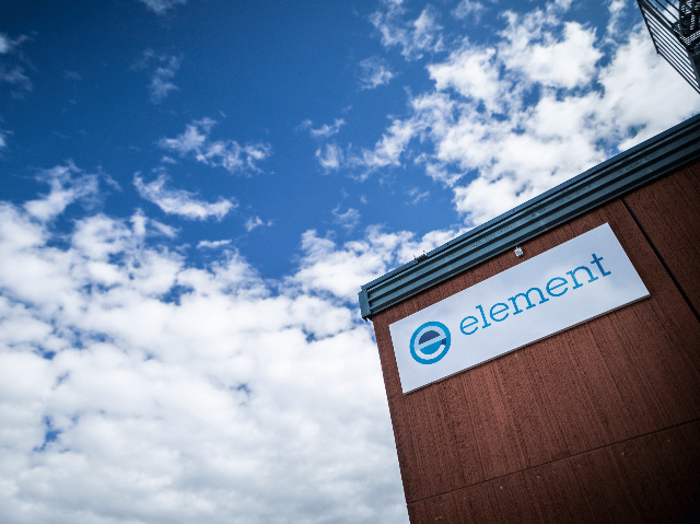 Lab building with Element sign against blue sky background