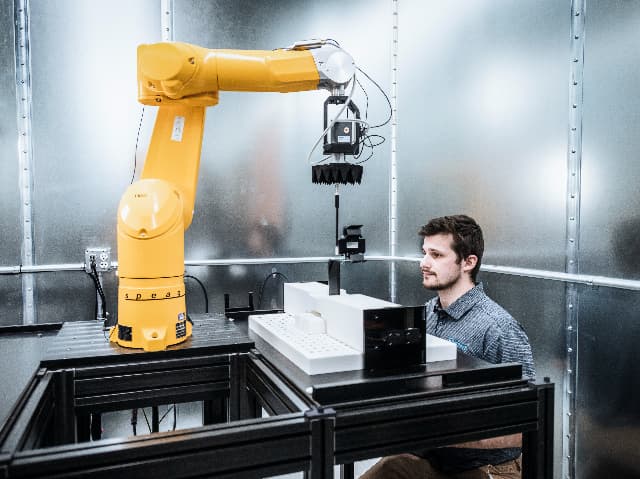 Element engineer monitoring SAR equipment during technology testing